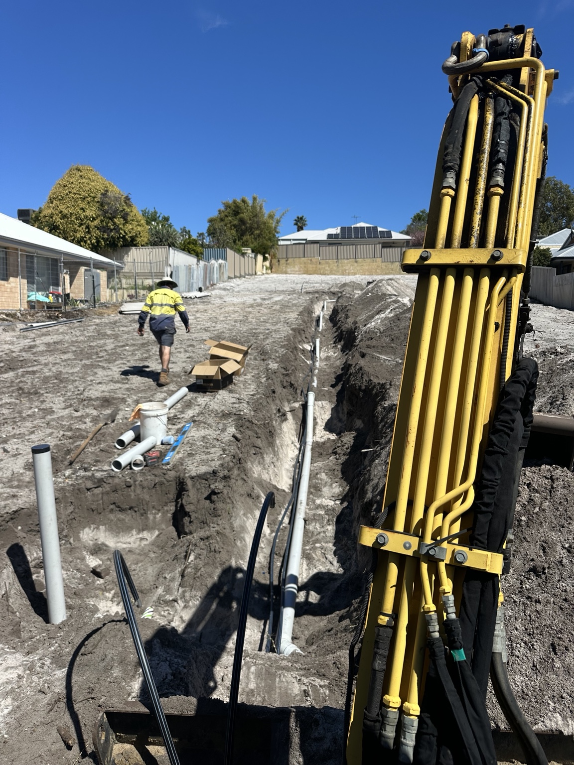 Subdivision trenching and pipe installation
